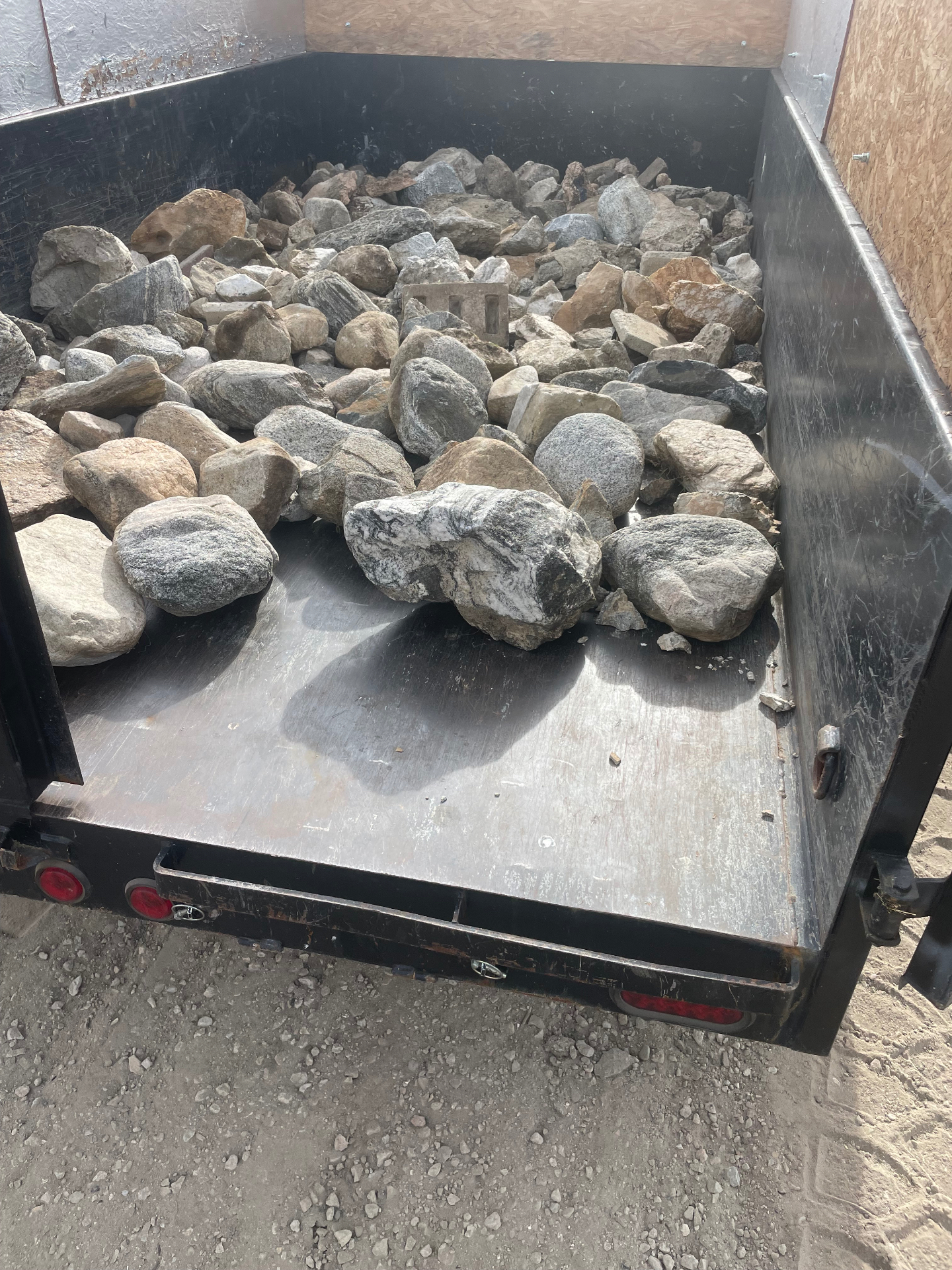 Rock and yard debris removed.
